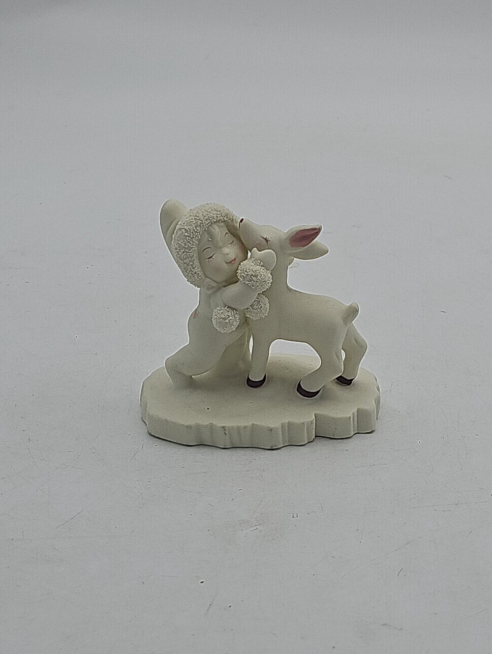 Tykes on Ice Child With Deer Playful Winter Holiday Christmas Figurine